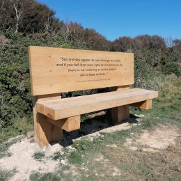 Interpretive bench front wooden quote