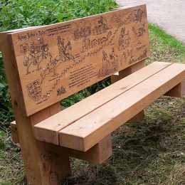 Interpretive bench routed back rest