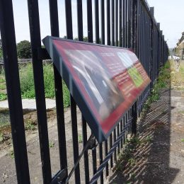 Railing mounting steel lectern sign