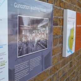 Wallmounting interpretation tray display