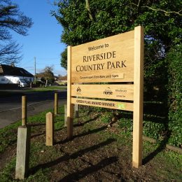Woodsman entrance signage