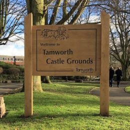 Woodsman entrance wood sign