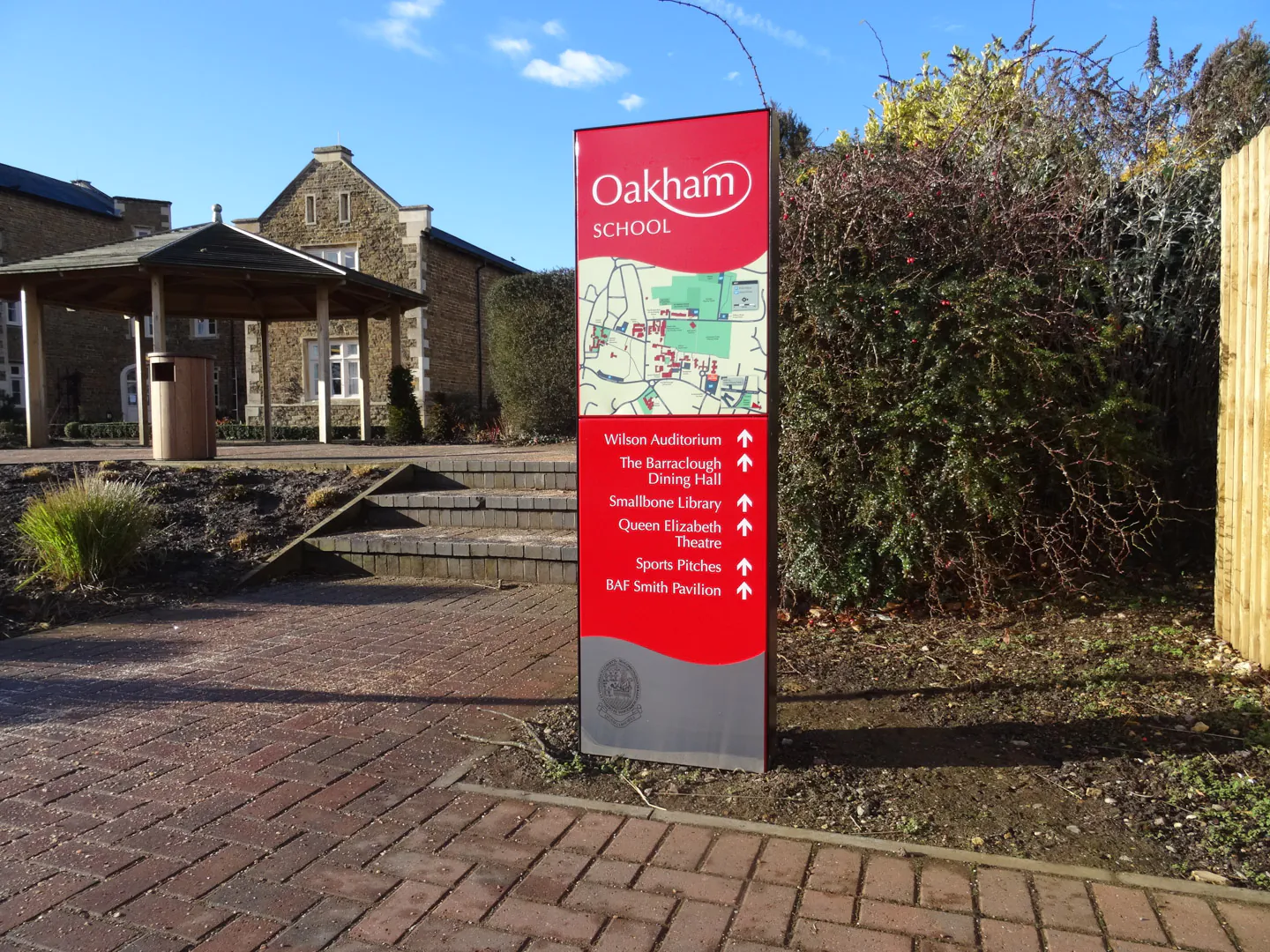 Enigma school monolith entrance sign