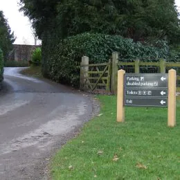 Grenadier directional parking sign